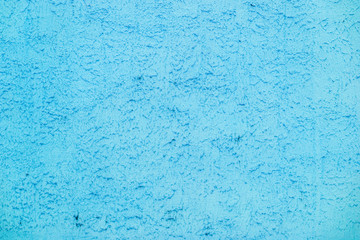 Cool-background texture of decorative stucco blue on the wall