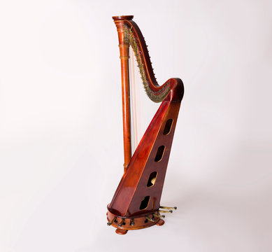 Harp isolated on white background silhouette shellak wooden mucical instrument 