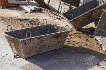 Clean concrete bucket for receiving concrete at a construction site. Concrete bucket for wet...