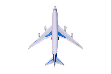 Model airplane on a white background. Toy airplane, top view. Passenger liner for flying around the...