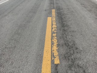 Fototapeta premium Asphalt roads in Thailand and yellow traffic lines
