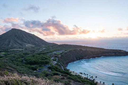 Hanama Bay sunrise - orange - golden hour - over pacific ocean