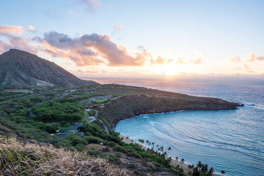 Hanama Bay sunrise - orange - golden hour - over pacific ocean