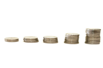 stacks of Ukrainian coins in order of growth. White background. The concept of revenue growth. Business success. The growth of economics.