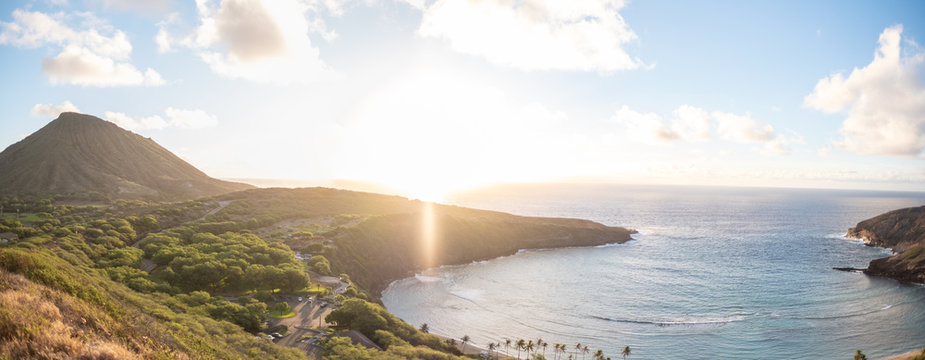 Hanama Bay sunrise - orange - golden hour - over pacific ocean