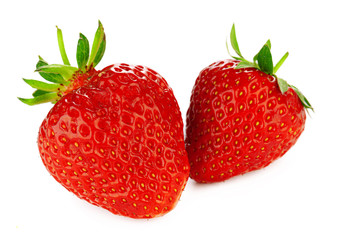 Two strawberries isolated on white background