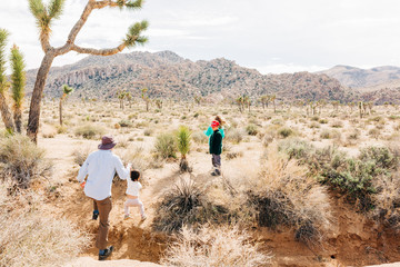 Family Exploring Desert Landscape