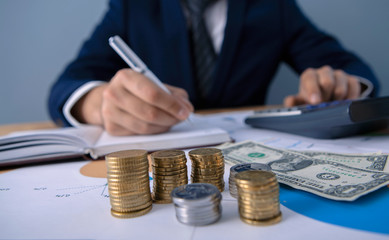 Fototapeta premium businessman considers company profit in office