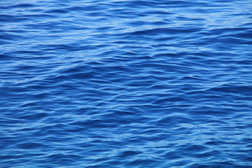 Surface of blue ocean background