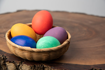 colorful easter eggs in a basket