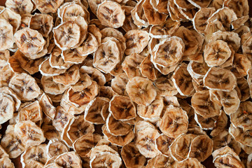 Homemade Dehydrated Banana Chips. dehydrated slices of bananas. healthy food. healthy snack