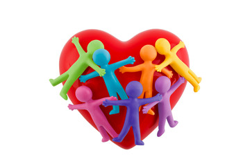 Group of colorful people figures sticking together with red heart isolated on white background with...