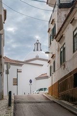 Narrow Street and Church in the Algarve, Portugal