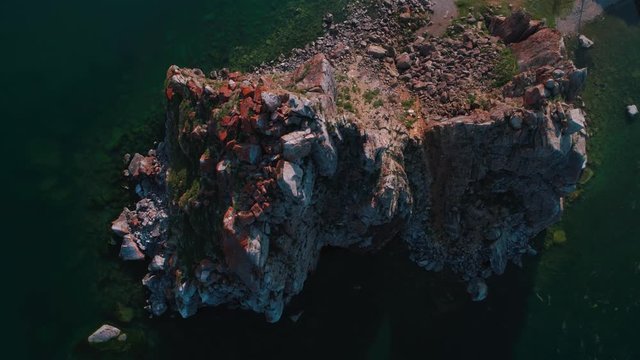 Aerial Drone Footage. Summer. Lake Baikal. Olkhon Island. Rocks in the Siberia. Cape Burkhan Shamanka 
