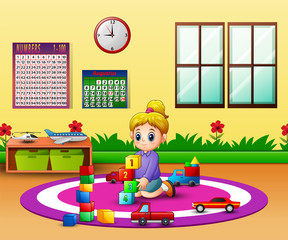 Happy girl playing with blocks toys