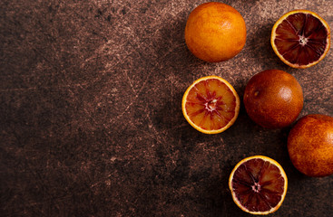 Red Spanish oranges fruit at rustic background