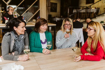 People having fun in a wine bar