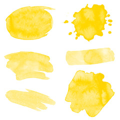 Vector set of yellow paint splashes on white background