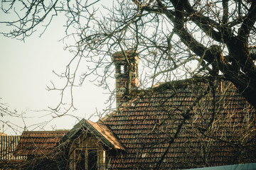 Fototapeta na wymiar chimney on the roof of the house