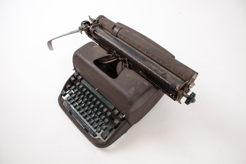 Antique typewriter isolated on white background