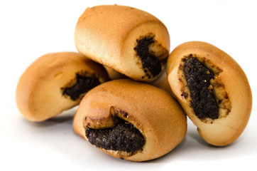small buns with poppy seeds isolated on a white background. Delicious homemade food.