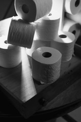 Dramatic Close up toilet paper supply
