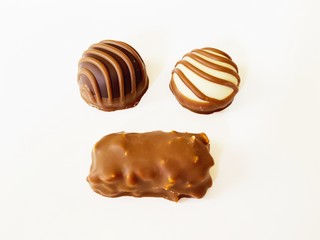 Milk and dark chocolate on white background