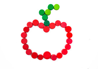 Apple symbol made with bottle caps on isolated background