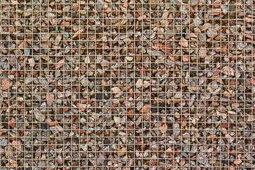 Stone filled metal mesh fence