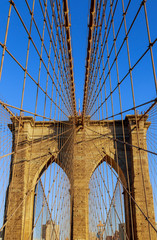 Upward image of Brooklyn Bridge in New York