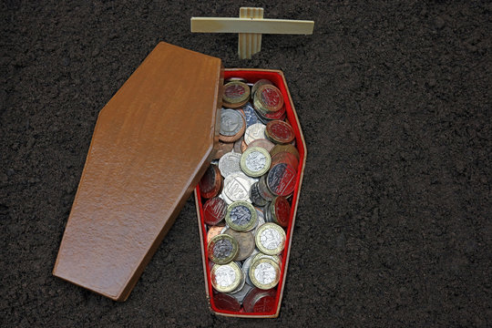 Coins In A Small Coffin. 