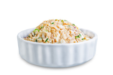 Canned Tuna red onion egg salad on a white isolated background
