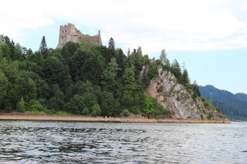 Fototapeta na wymiar Castle on a rock by the lake