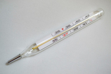 medical thermometer on white