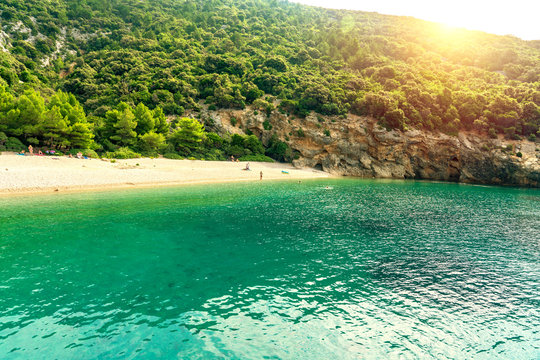 Hidden Lubenice beach in Cres island Croatia with crystal clear turquoise water