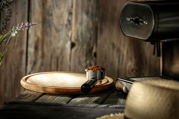 Fototapeta premium Coffee on a wooden table in the glow of the morning sun