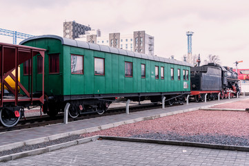 Old passenger train. The old railway train. Vintage black locomotive.