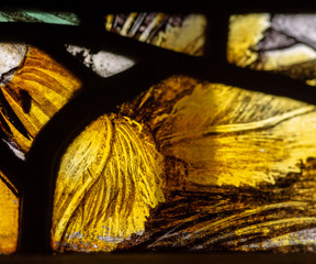 Detail of vivid yellow stained glass window