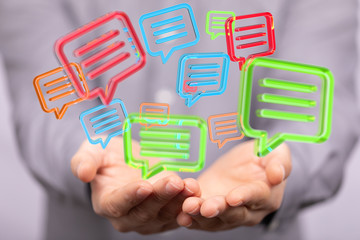 Digital icons with colorful dialog speech bubbles.