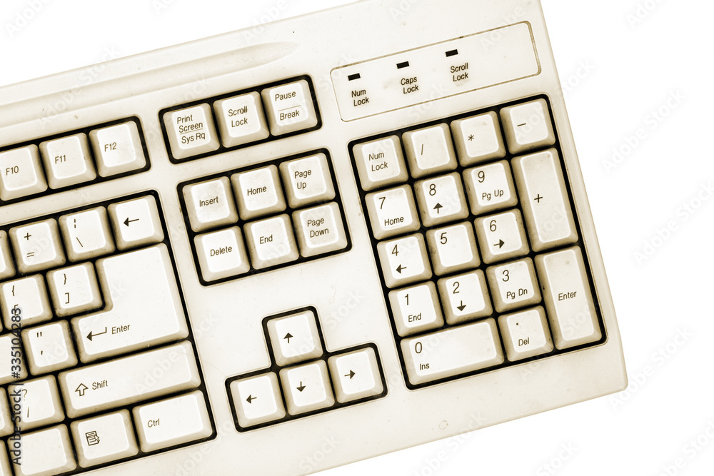 Fototapete old computer close-up keyboard numbers panel isolated on white background