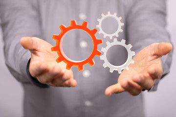 Business, Internet and technology concept. Business select gear icon on virtual screen.