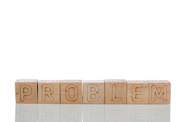 Wooden cubes with letters problem on a white background