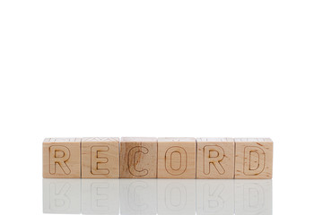 Naklejka premium Wooden cubes with letters record on a white background