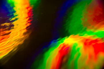 Cercles muraux Mélange de couleurs Holographic, goniochromism macro rainbow texture. Ligh leaks, disco illumination effect. Abstract background
