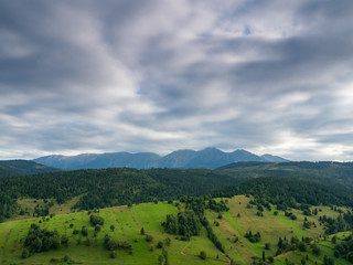 Fototapeta na wymiar Summer in Spisz in Poland and Slovakia with view to Tatra Mountains. Dramatic sky.