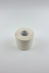 New toilet roll on white background
