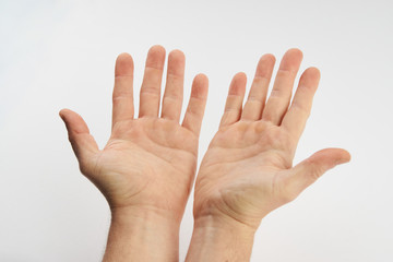 Man's clean hands isolated on white background with copy space.