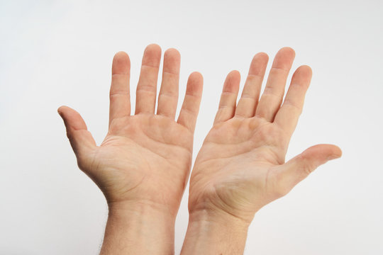 Man's Clean Hands Isolated On White Background With Copy Space.