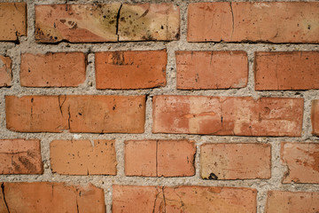 Fototapeta premium Red brick wall masonry. Texture close up