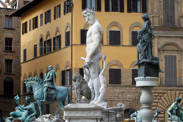 Statues, including the Fountain of Neptune (1565), in Piazza della Signoria in Florence, Italy.